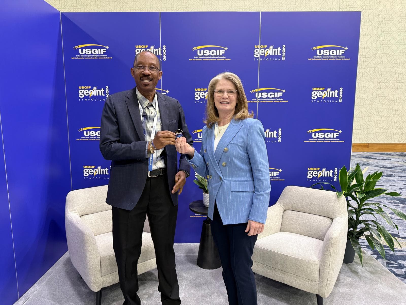 The Founder, Dr AA. Usman recognized and honored with the USGIF GOLD COIN by the Chief Executive of the United States Geospatial Intelligence Foundation (USGIF) Ronda Schrenk