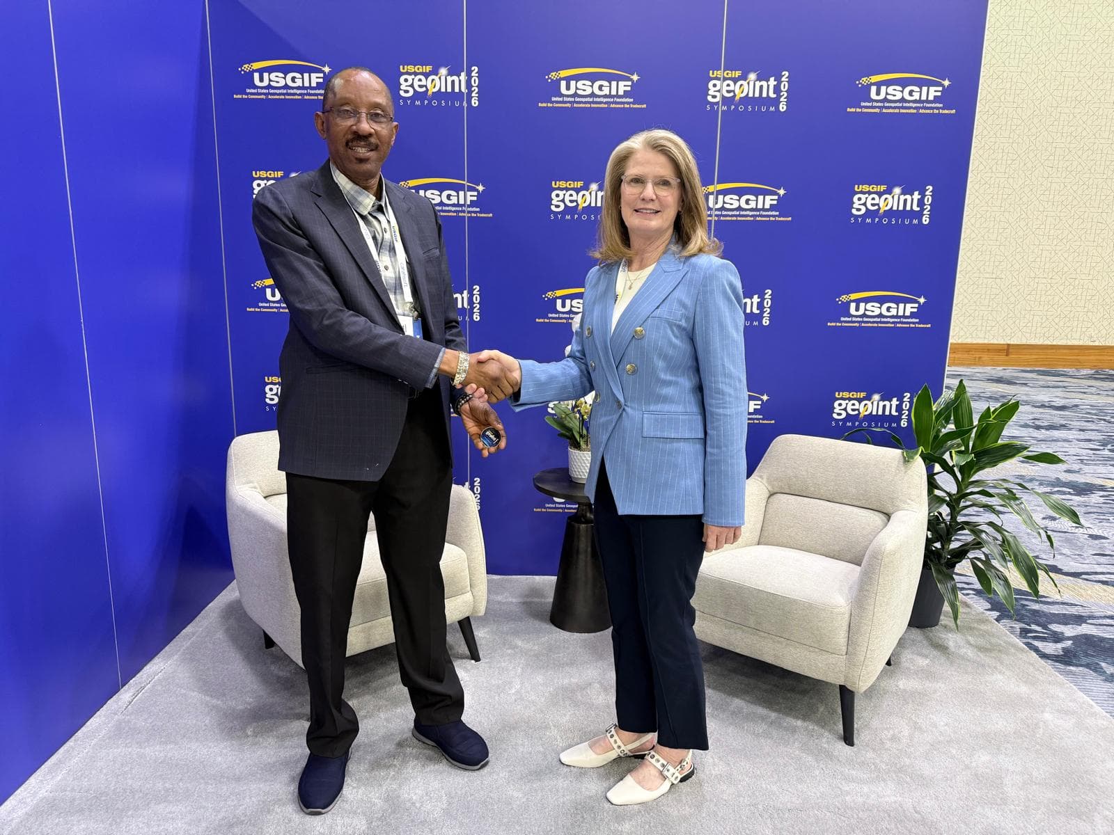 The Founder, Dr AA. Usman recognized and honored with the USGIF GOLD COIN by the Chief Executive of the United States Geospatial Intelligence Foundation (USGIF) Ronda Schrenk